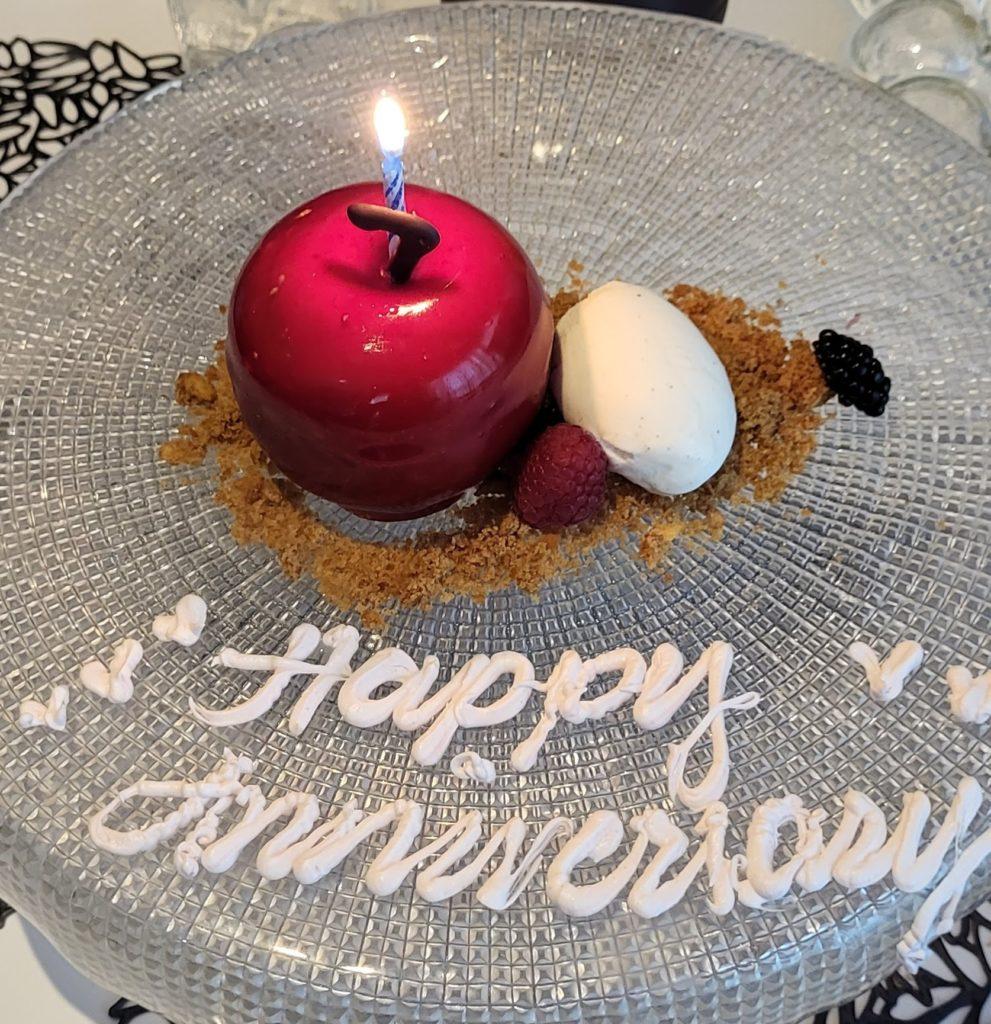 Apple Dessert with Anniversary Message at Royal Caribbean Wonderland Restaurant.